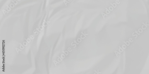 White satin crumpled paper texture and White crumpled paper texture crush paper so that it becomes creased and wrinkled. Old white crumpled paper sheet background texture.