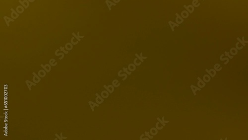 yellow abstract motion background with flashlight effects.4k video capture