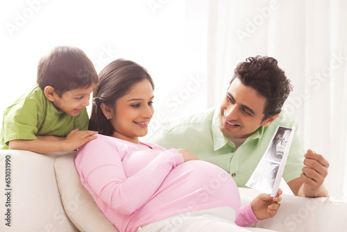 Family looking at ultrasound scans