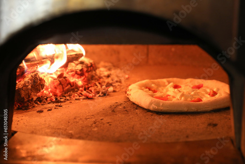 Neapolitan pizza in a fire oven