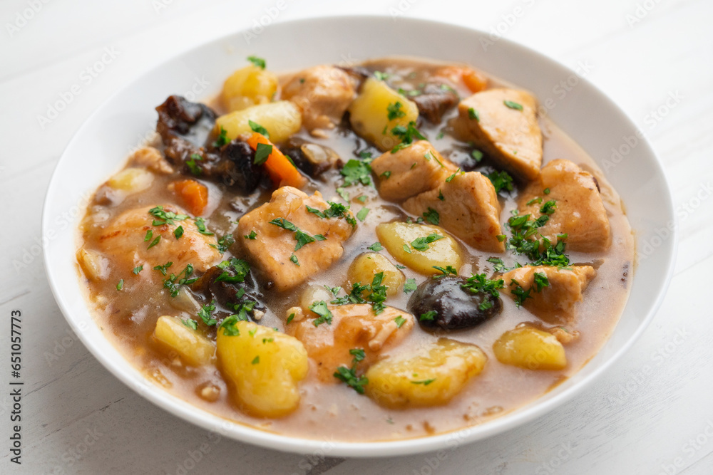 Turkey stew with potatoes and prunes. - obrazy, fototapety, plakaty 