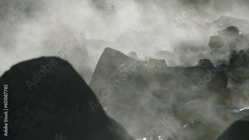 Close up view of the stones covered in vapour of Kirkham Hot Springs, Idaho. photo