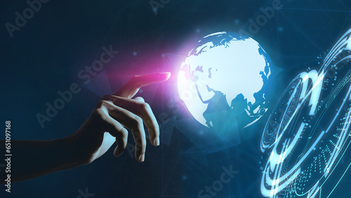 Hand point to global internet technology to connect people.Business global, social media and digital marketing.Technology and futuristic dark blue color background.