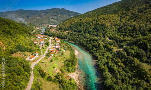Aerial drone view of valley of the Drina river in Bosnia and Herzegovina in sunny weather.  photo