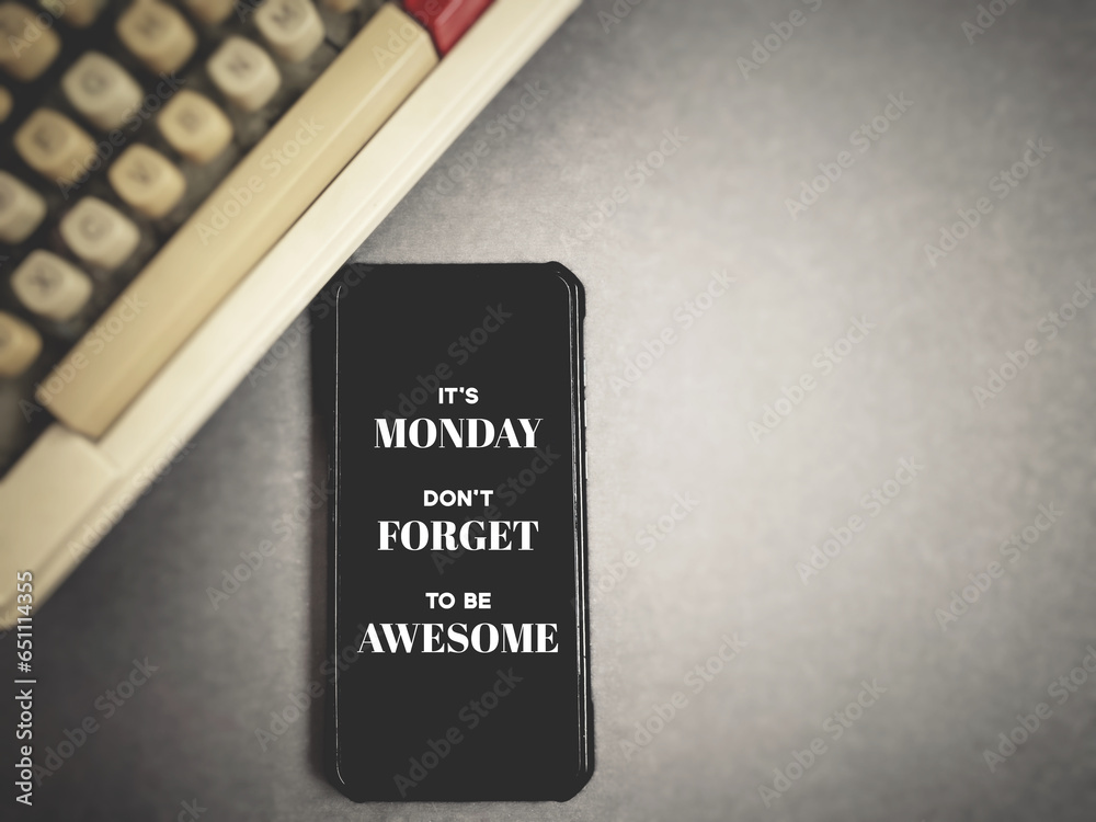 Inspirational quote - it's monday don't forget to be awesome message on mobile with retro background. Inspirational quote - it's monday don't forget to be awesome message on mobile with retro background.