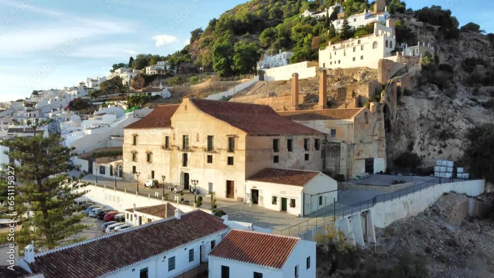 Aerial view of Palacio de los Condes ascending
Frigiliana is one of the prettiest and most famous Moorish white villages in Andalucia and a popular tourist destination.