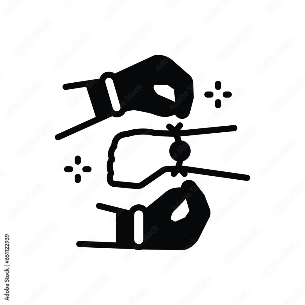 Black solid icon for rakhi in hand Black solid icon for rakhi in hand