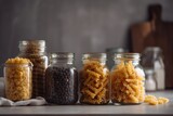 Different types of pasta set in jars on dark moody background. Generative AI.
