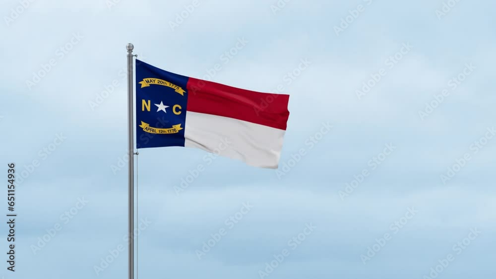 North Carolina US state flag waving in the wind with cloudy sky, endless seamless loop North Carolina US state flag waving in the wind with cloudy sky, endless seamless loop
