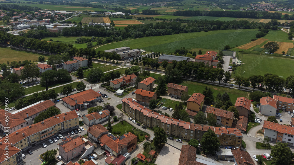 Aerial View of Vipava Town, Slovenia. Red Roofs and Fields in the Background