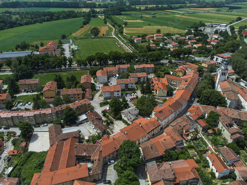 Aerial View of Vipava Town, Slovenia. Red Roofs and Fields in the Background photo