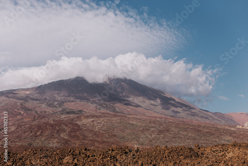 Scenic view of volcanic rock formations in desert during sunny day, Teide National Park, Tenerife