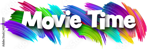 Movie time paper word sign with colorful spectrum paint brush strokes over white.