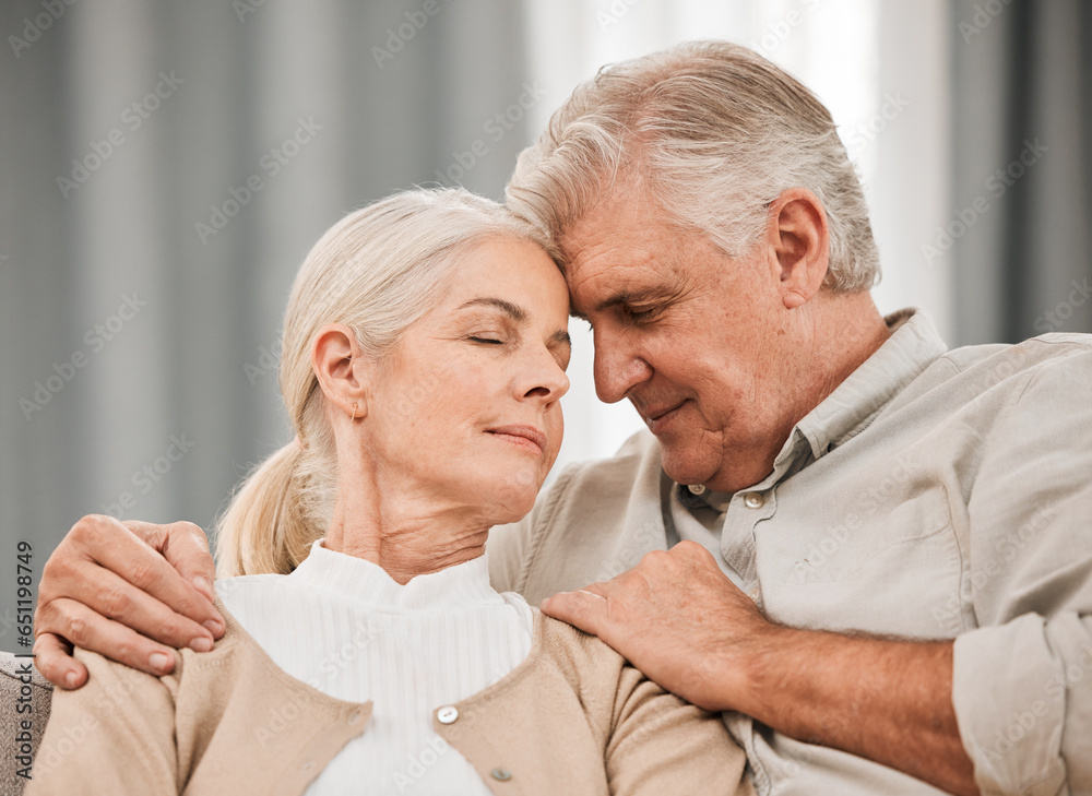 Old people, hug and forehead touch, relax on sofa with love and support, bonding while at home with trust and comfort. Couple together in marriage, partner and retirement with calm and peace of mind Old people, hug and forehead touch, relax on sofa with love and support, bonding while at home with trust and comfort. Couple together in marriage, partner and retirement with calm and peace of mind