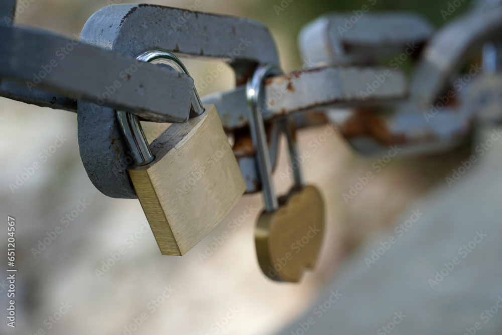 Many padlocks closed on bridge fence - love concept Many padlocks closed on bridge fence - love concept
