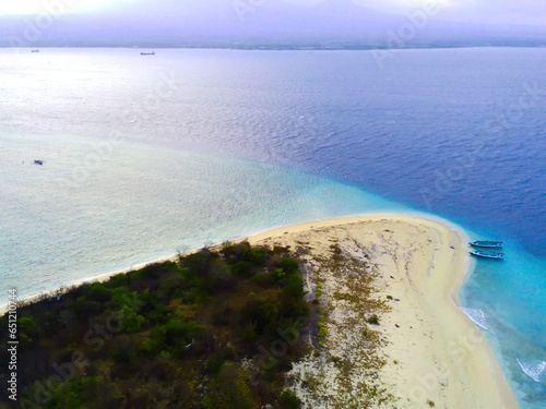 Aerial photo of Pulau Tabuhan, Banyuwangi. White sand beaches and crystal clear waters. photo