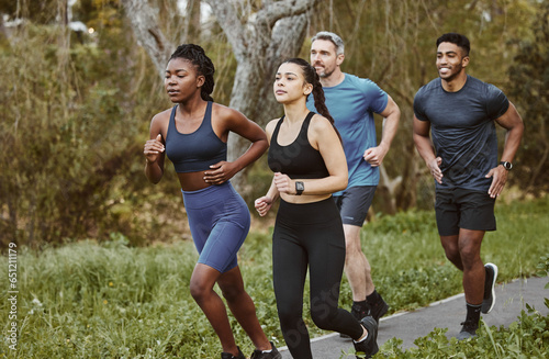 Runner group, men and women in park, training and outdoor exercise for health, sport or performance. Teamwork, running and workout for fitness, wellness and diversity in summer, freedom or nature