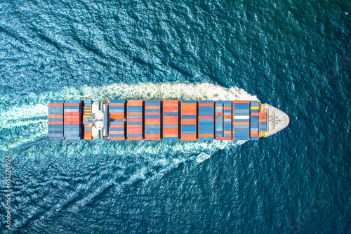 Top viewContainer ship loading and unloading in sea port, Aerial view of business logistic import and export freight transportation in harbor, Container loading Cargo freight ship, Dubai
