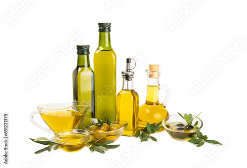 Olive oil in a bottle isolated on white background. Oil bottle with branches and fruits of olives. Place for text. copy space. cooking oil and salad dressing.