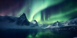 Aurora borealis above the snow covered mountains in Lofoten islands, Norway. Northern lights in winter. Night landscape with polar lights