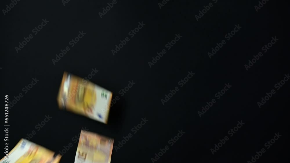 Slow flow towards euro banknotes currency movement background, money flying endless flow on black background.