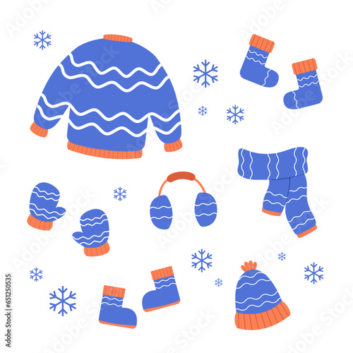 Set of flat Winter clothes and cold weather accessories. Flat Hats, scarves, mittens, and socks.
