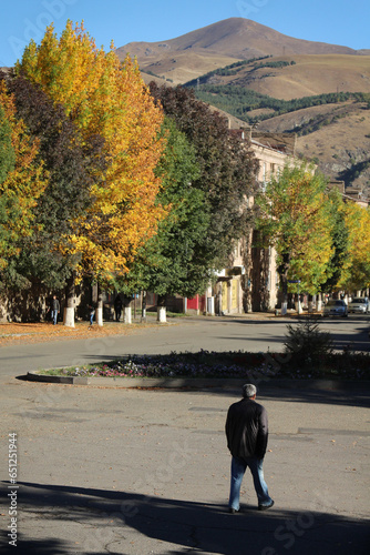 person walking on the autumn street (ID: 651251944)