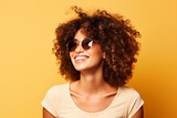 Young japanese woman with toothless smile, curly hair, half body model shot, casual pose, wears sunglasses, light yellow background, surreal, very friendly