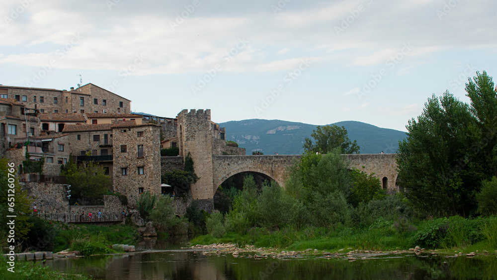 View of the medieval village, the bridge and the river of Besalú in Catalonia (Spain).