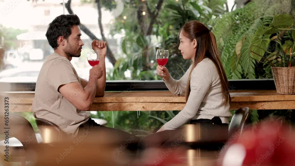 4K, Attractive Indian husband with beard and Asian wife relaxing drinking wine after long day working in cafe coffee shop, restaurant shopkeeper couple happy in small business celebrate 4K, Attractive Indian husband with beard and Asian wife relaxing drinking wine after long day working in cafe coffee shop, restaurant shopkeeper couple happy in small business celebrate