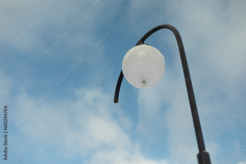 Lamp on the street. A pole with a lamp. Round light source. Lamp on the street. A pole with a lamp. Round light source.
