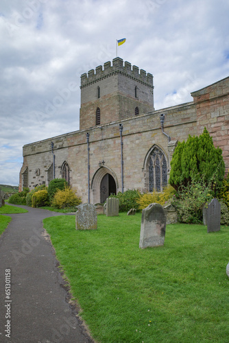 Bamburgh, England - 13 July, 2023: The Church of St Aidan in Bamburgh, Northumberland photo