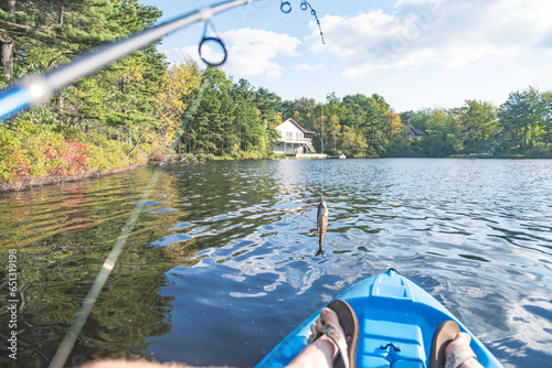 Kayak fishing catching fish, summer vacation, leisure hobbies copy space photo