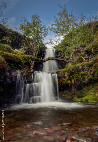 One of a series of waterfalls that roll down the mountains in the Brecon Beacons in South Wales UK 