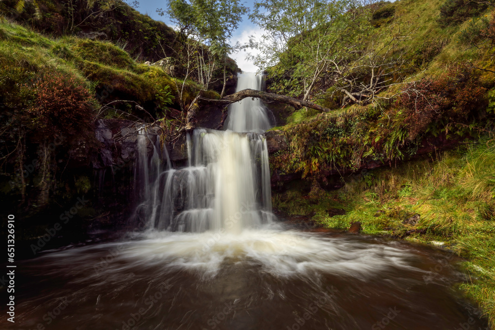 Fototapeta premium One of a series of waterfalls that roll down the mountains in the Brecon Beacons in South Wales UK 