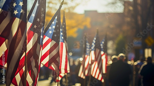 In mid-morning sunlight, a Veterans Day parade with American flags, and uniformed military veterans showcases patriotic spirit and unity, highlighting their determination. photo