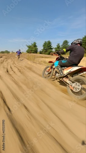 FPV of riders on a motocross track. High-speed. photo