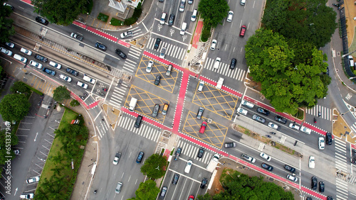 Top view famous crossing between Reboucas avenue and Brazil avenue at downtown Sao Paulo Brazil. Vehicles traffic at famous avenues at downtown Sao Paulo Brazil. Pedestrian crosswalk. photo