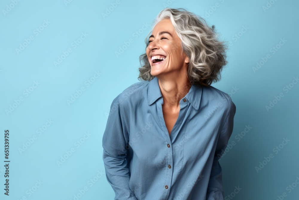 Portrait of a beautiful mid age woman with grey hair. Portrait of a beautiful mid age woman with grey hair.