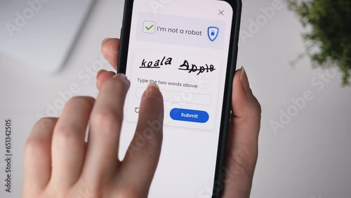 Completing CAPTCHA verification on a smartphone. Proving not to be a bot.