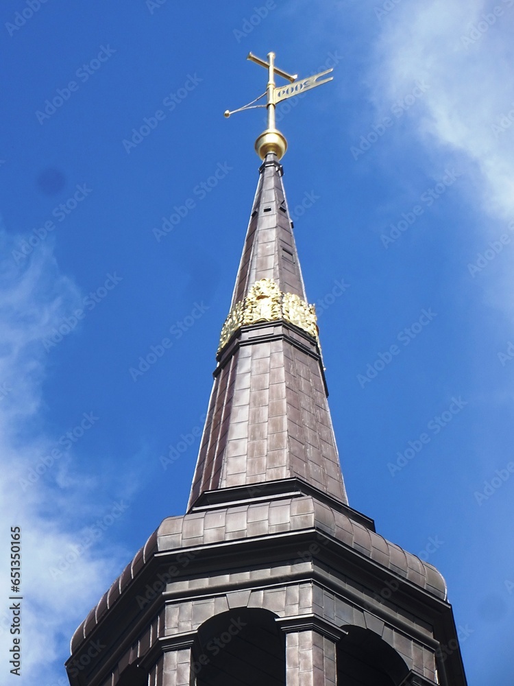 Tower of St. Catherine's Church in Hamburg with the golden crown of the infamous pirate Klaus Störtebeker Tower of St. Catherine's Church in Hamburg with the golden crown of the infamous pirate Klaus Störtebeker