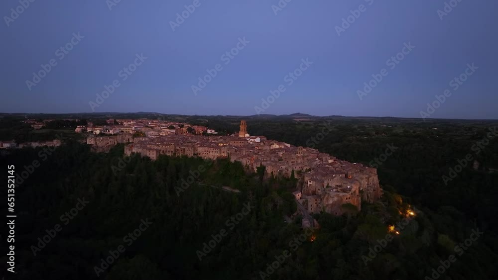 Aerial View of Medieval Pitigliano Town in Tuscany, Grosseto Province, Italy. Scenic Landscape of Historic Village in Southern Tuscany, evening night Aerial View of Medieval Pitigliano Town in Tuscany, Grosseto Province, Italy. Scenic Landscape of Historic Village in Southern Tuscany, evening night