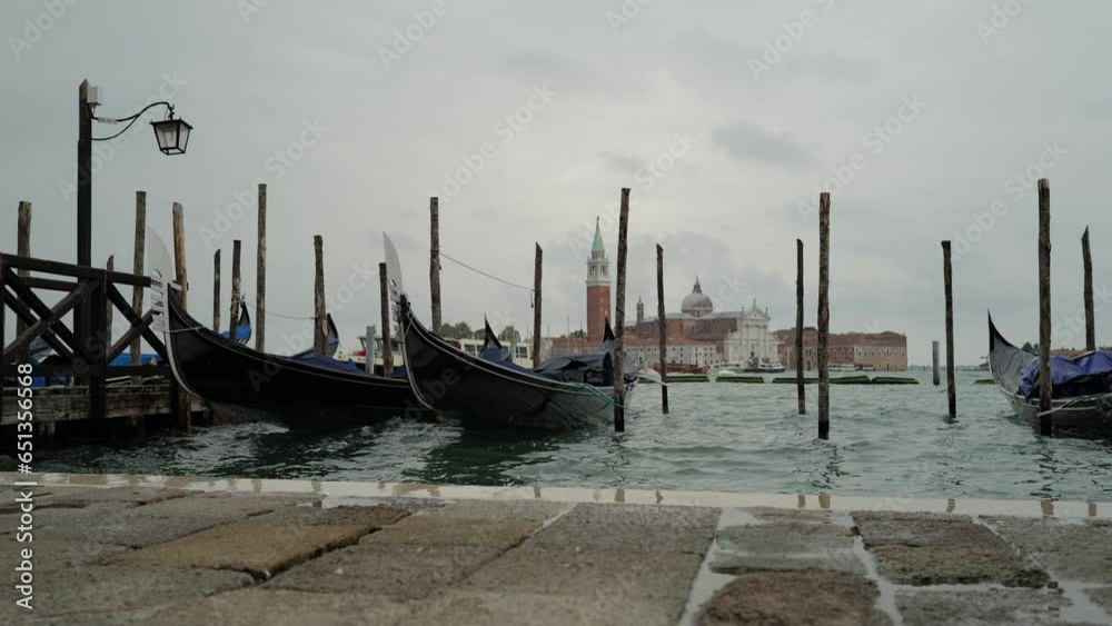 Venice, Italy - Gondolas and gondoliers in the San Marco basin and in the canals of the historic center under the Bridge of Sighs Venice, Italy - Gondolas and gondoliers in the San Marco basin and in the canals of the historic center under the Bridge of Sighs