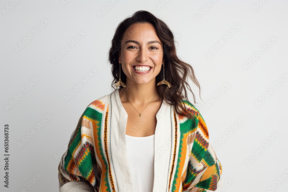 Portrait photography of a happy Peruvian woman in her 20s against a white background Portrait photography of a happy Peruvian woman in her 20s against a white background