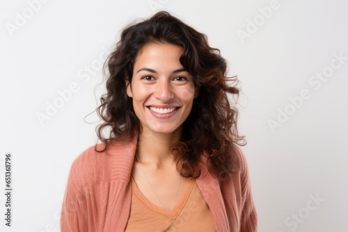 Medium shot portrait photography of a Peruvian woman in her 30s against a white background