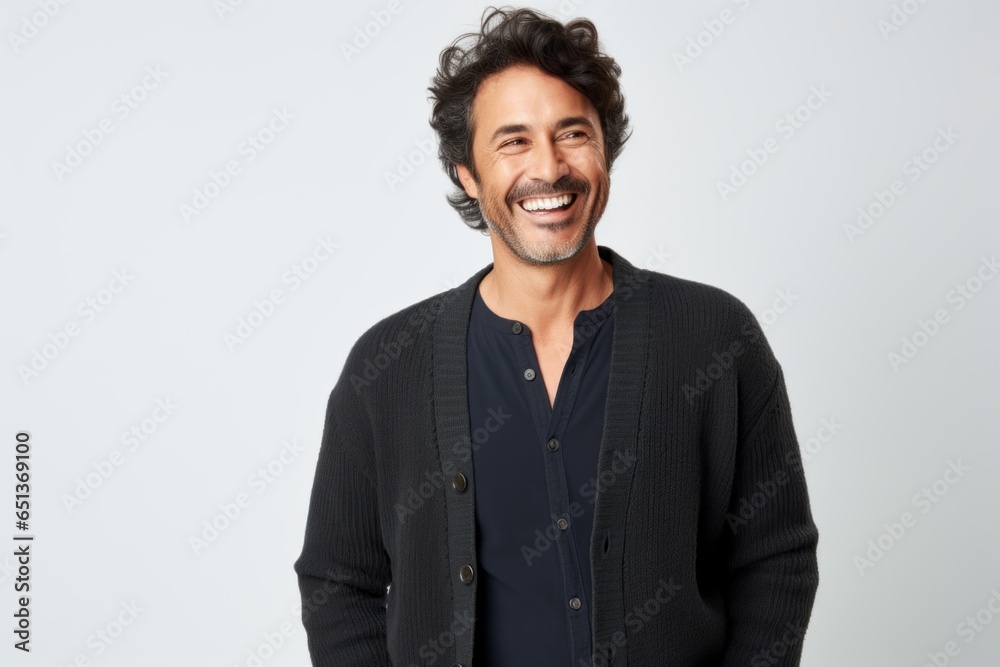 Lifestyle portrait photography of a happy Peruvian man in his 40s against a white background Lifestyle portrait photography of a happy Peruvian man in his 40s against a white background
