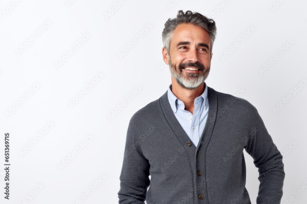 Lifestyle portrait photography of  an Italian man in his 40s against a white background