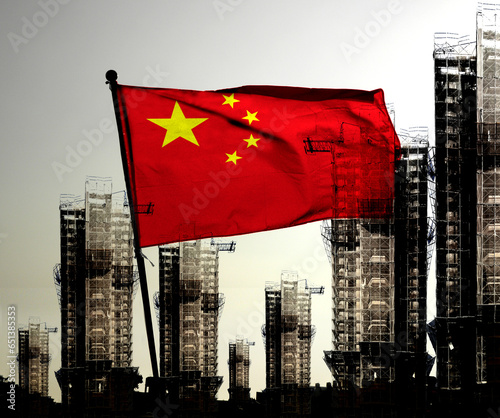 Double exposure creative hologram of unfinished supertall building and Chinese flag. Describe China's real estate collapse, bubble, financial turmoil, and China's Lehman storm     