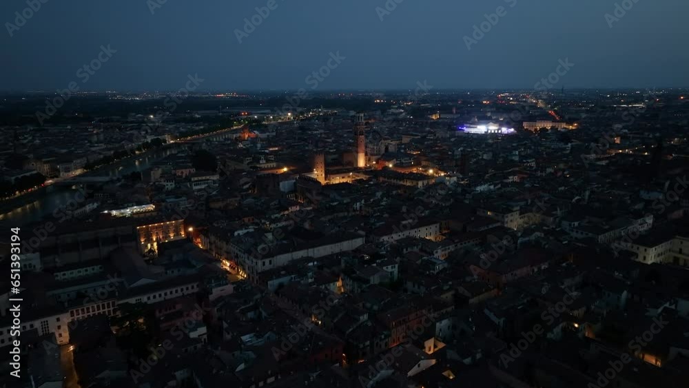 Verona Italy, aerial view of Piazza delle Erbe, Torre dei Lamberti, historical city centre, urban skyline, Cathedral, Veneto Region, night evening Verona Italy, aerial view of Piazza delle Erbe, Torre dei Lamberti, historical city centre, urban skyline, Cathedral, Veneto Region, night evening