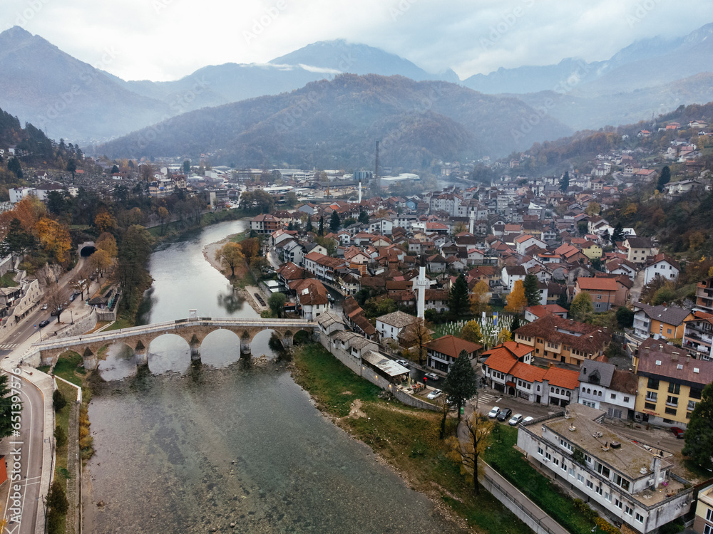 Aerial drone view of Konjic city, bridge, and river Neretva. Bosnia and Herzegovina.